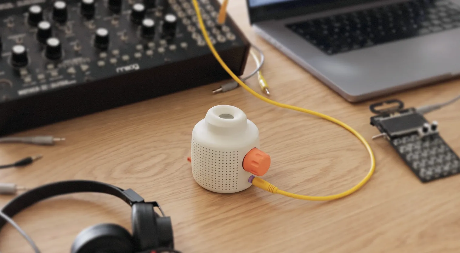 Murmur device on a desk connected to Moog synthesizers and other music gear